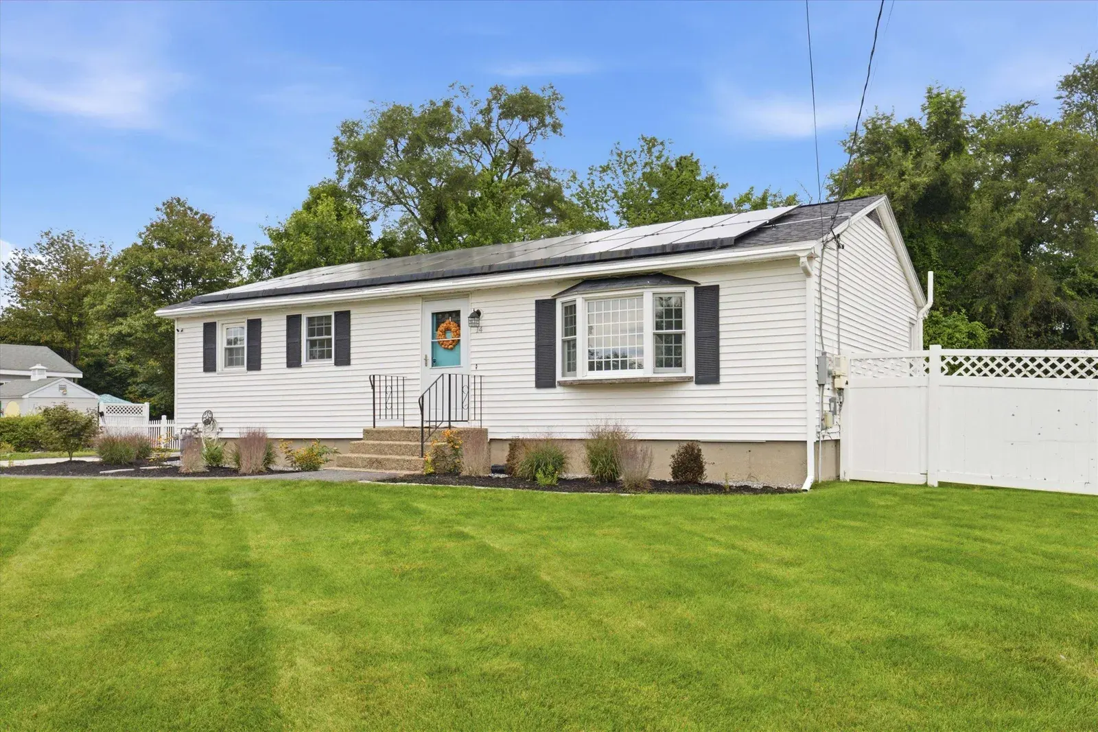 Front exterior in daylight at 14 Bloomingdale Drive