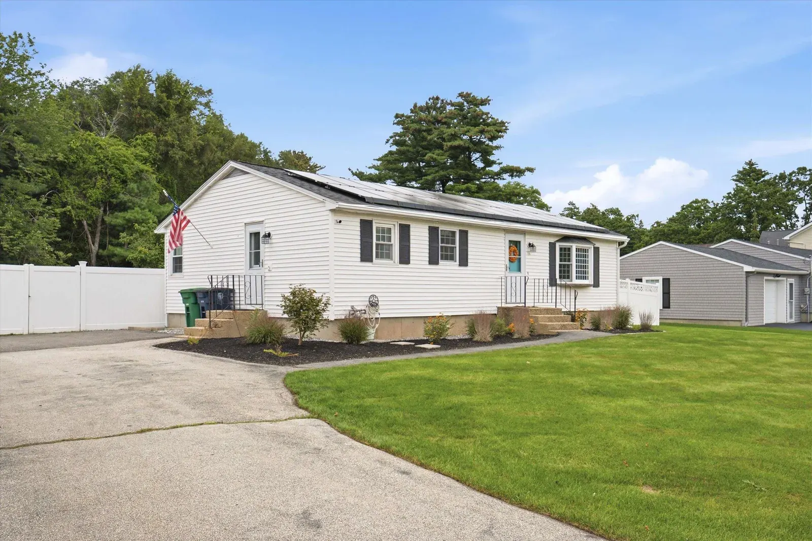 Driveway and front exterior in daylight at 14 Bloomingdale Drive