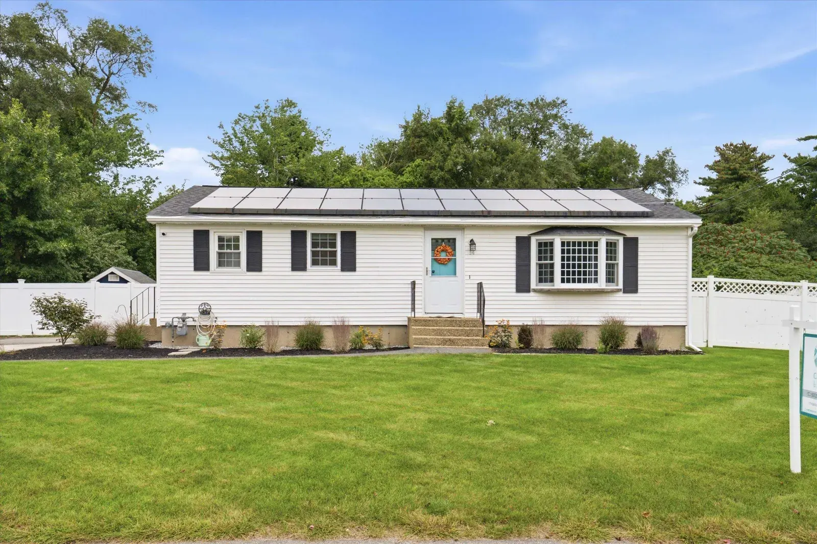 Front lawn and ranch exterior at 14 Bloomingdale Drive