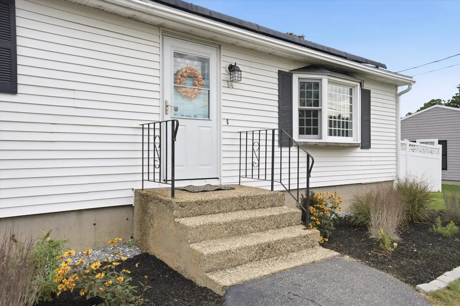 Front steps and entry door at 14 Bloomingdale Drive