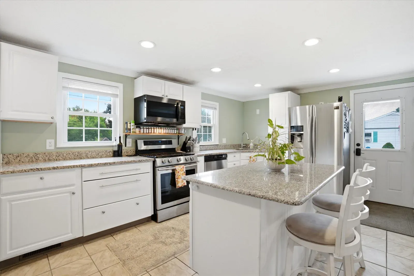 Kitchen island facing the entry at 14 Bloomingdale Drive