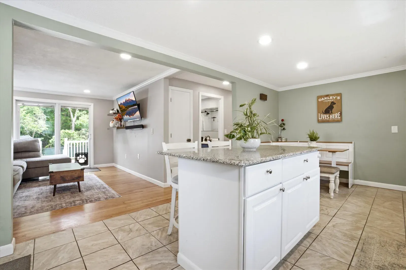 Kitchen opening to the living room at 14 Bloomingdale Drive