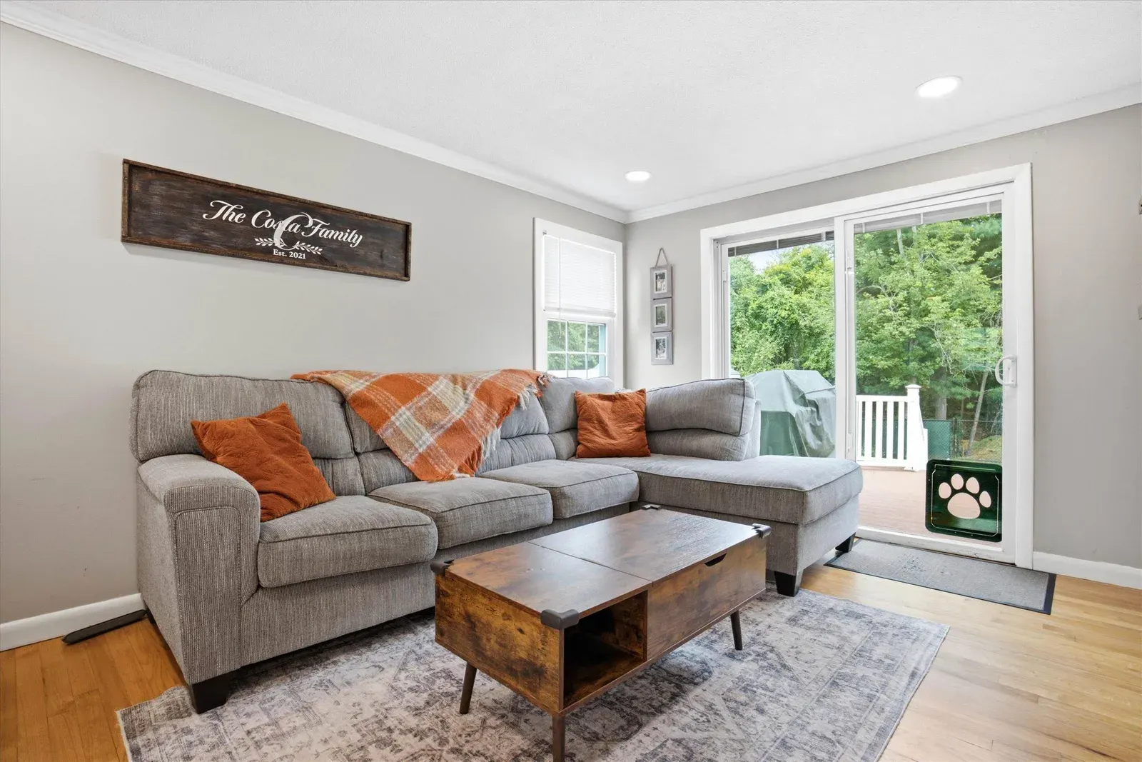 Living room with sliding doors to the deck at 14 Bloomingdale Drive