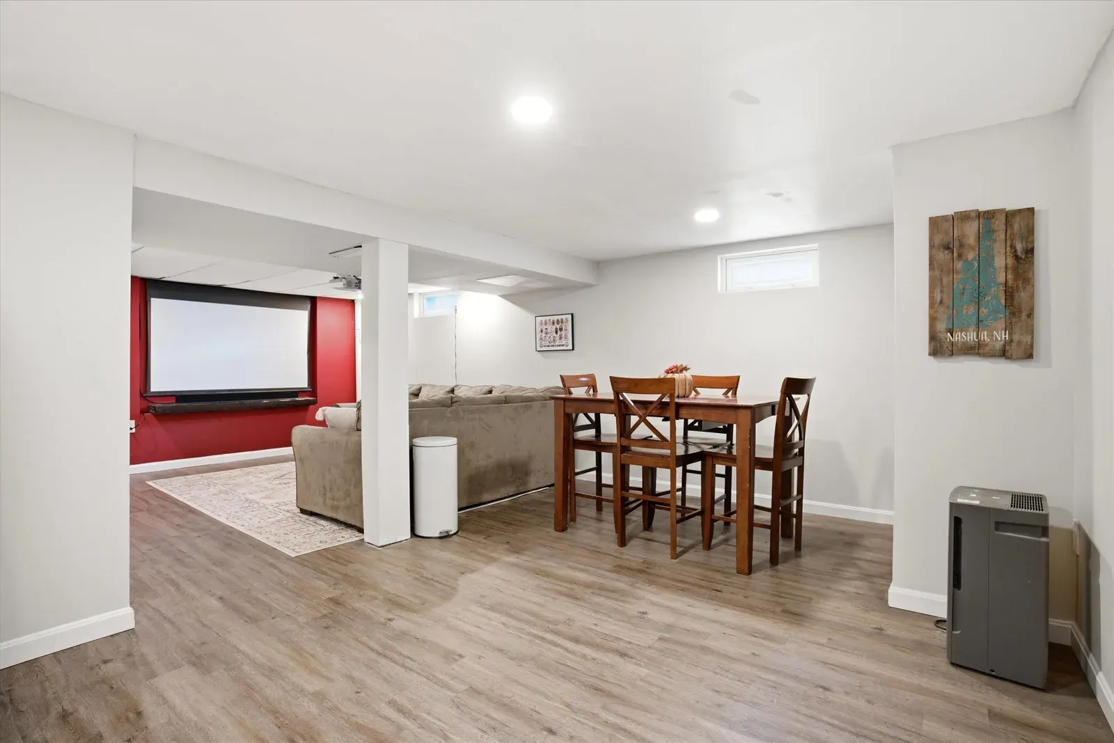 Lower-level dining and recreation space at 14 Bloomingdale Drive