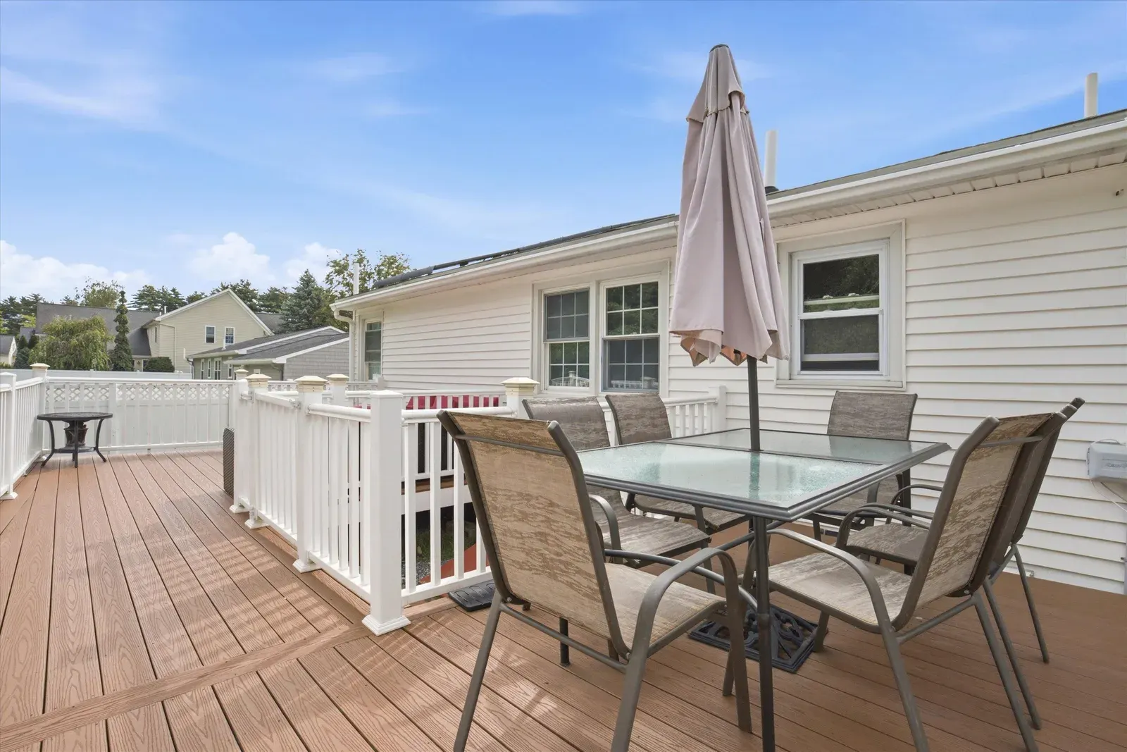 Deck dining area at 14 Bloomingdale Drive