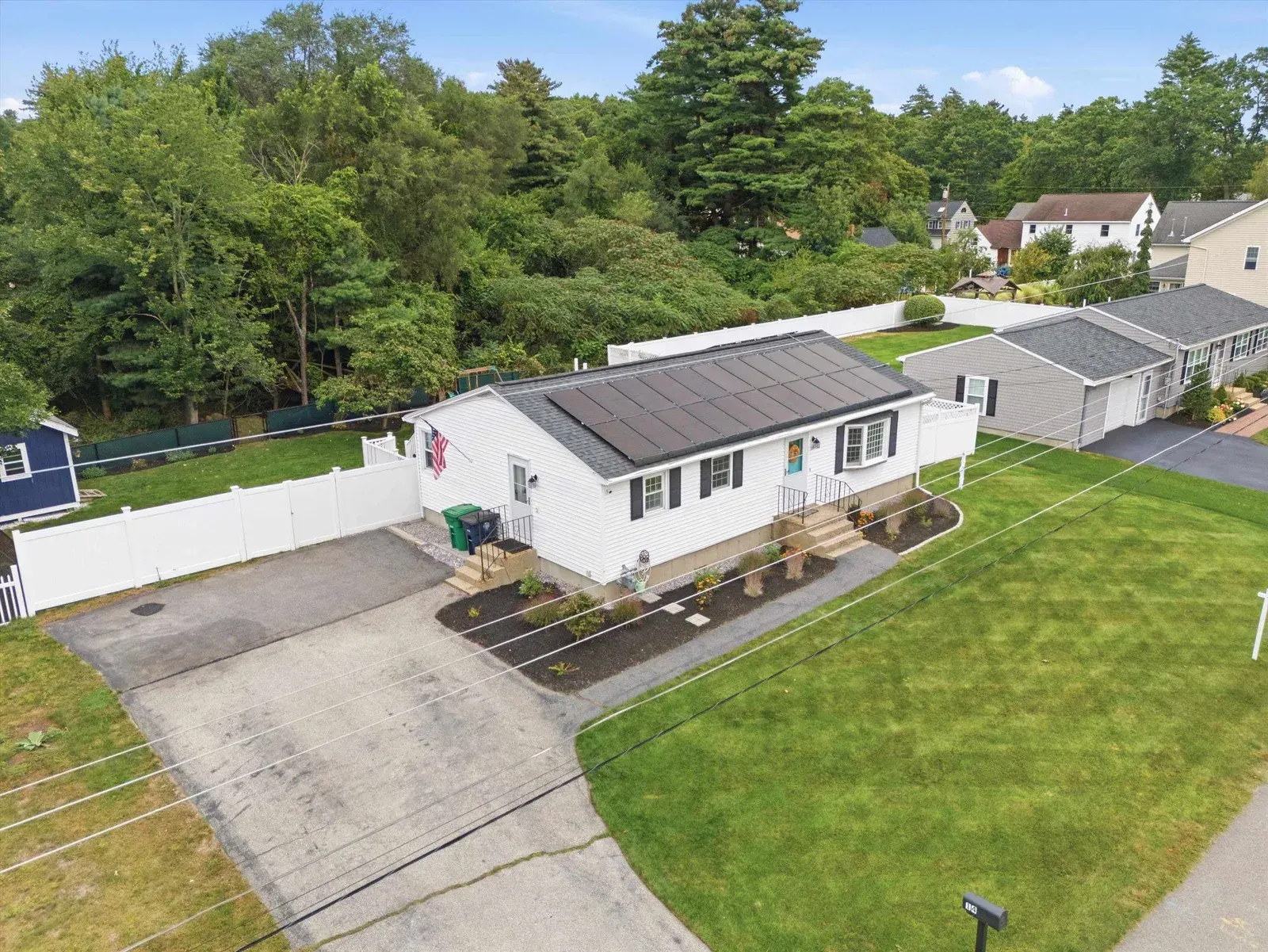 Aerial view of the home and driveway at 14 Bloomingdale Drive