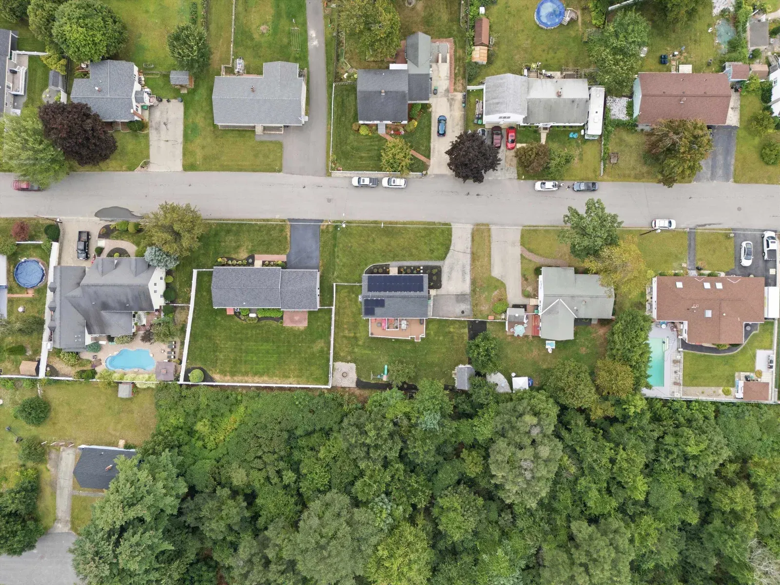 Overhead view of the property and street at 14 Bloomingdale Drive