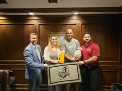 Tyler Costa and clients celebrating a new home purchase