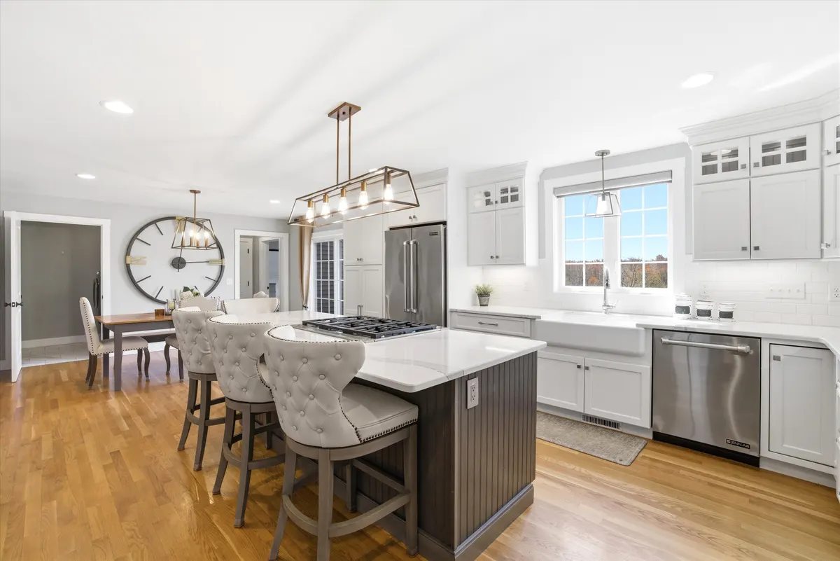 Bright kitchen and dining area in a Southern New Hampshire home listing